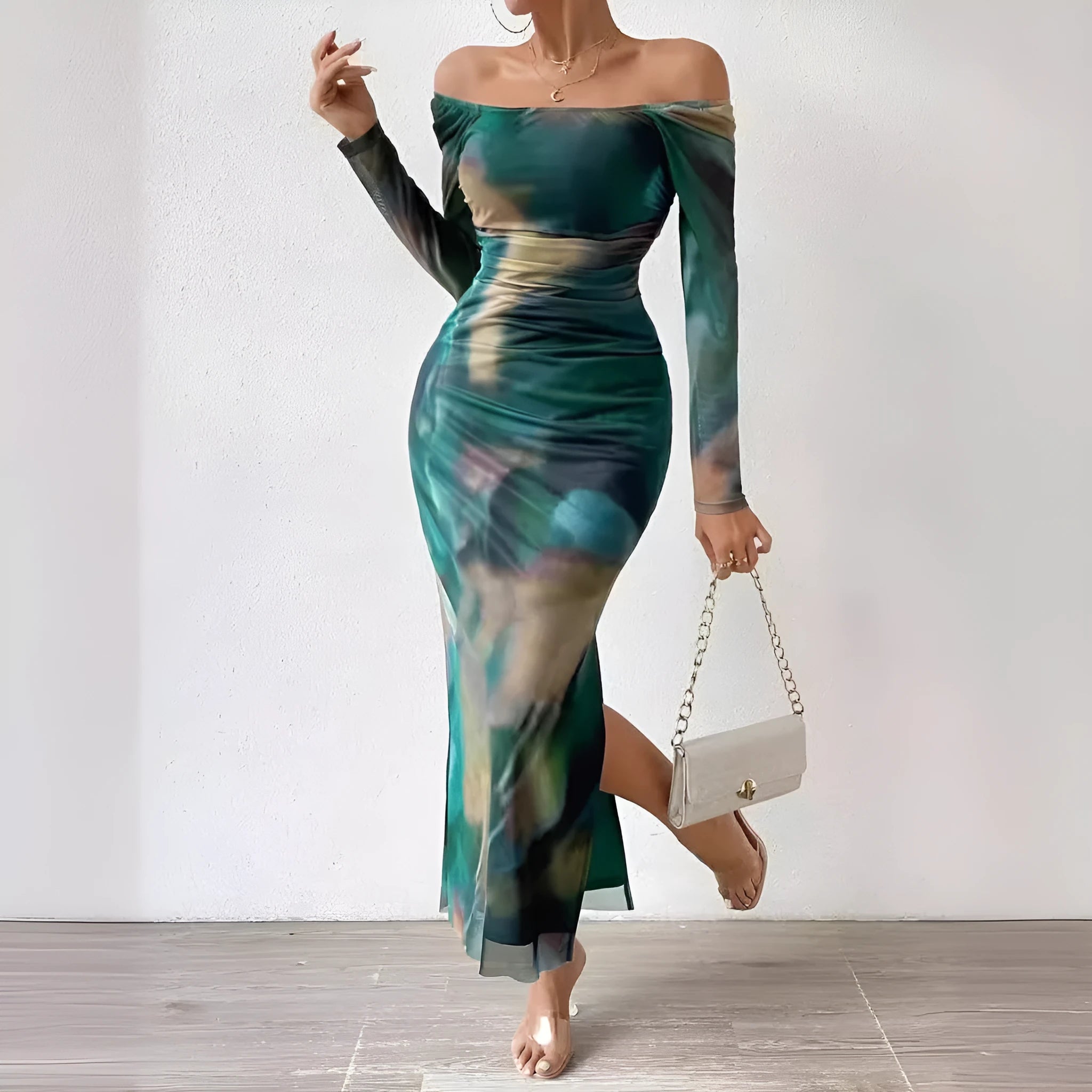 Womens long printed mesh fishtail dress with gradient colour pleating and split skirt detail