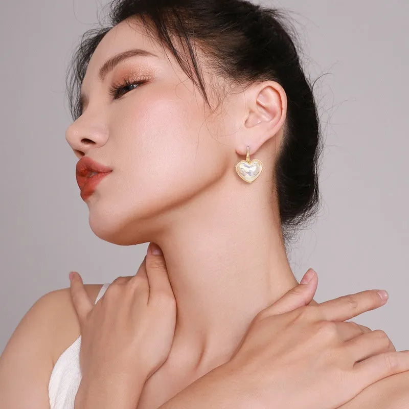 Gold alloy clip-on earrings with natural styling for women's summer fashion