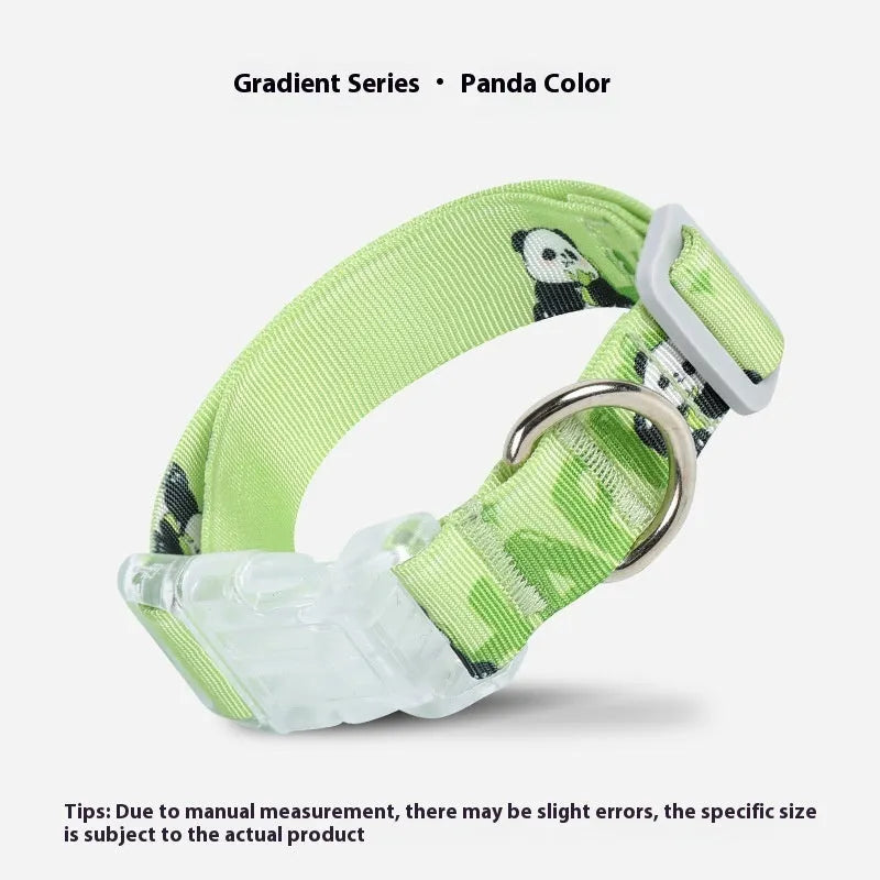 Adjustable nylon dog collar with cartoon gradient print and plastic buckle on a white background.