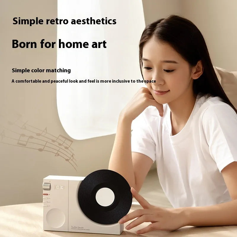 Obsidian Black mini Bluetooth speaker with matching gift bag and greeting card.