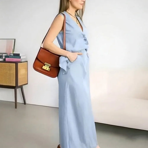 Blue polyester sleeveless vest and long skirt two-piece casual outfit on mannequin