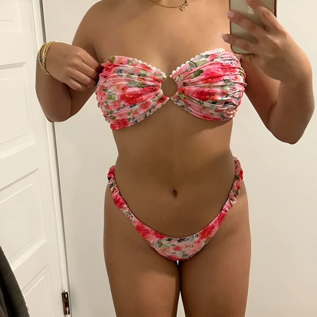 Women's tube top bikini set with lace trim in blue, yellow, pink, and floral print colours.
