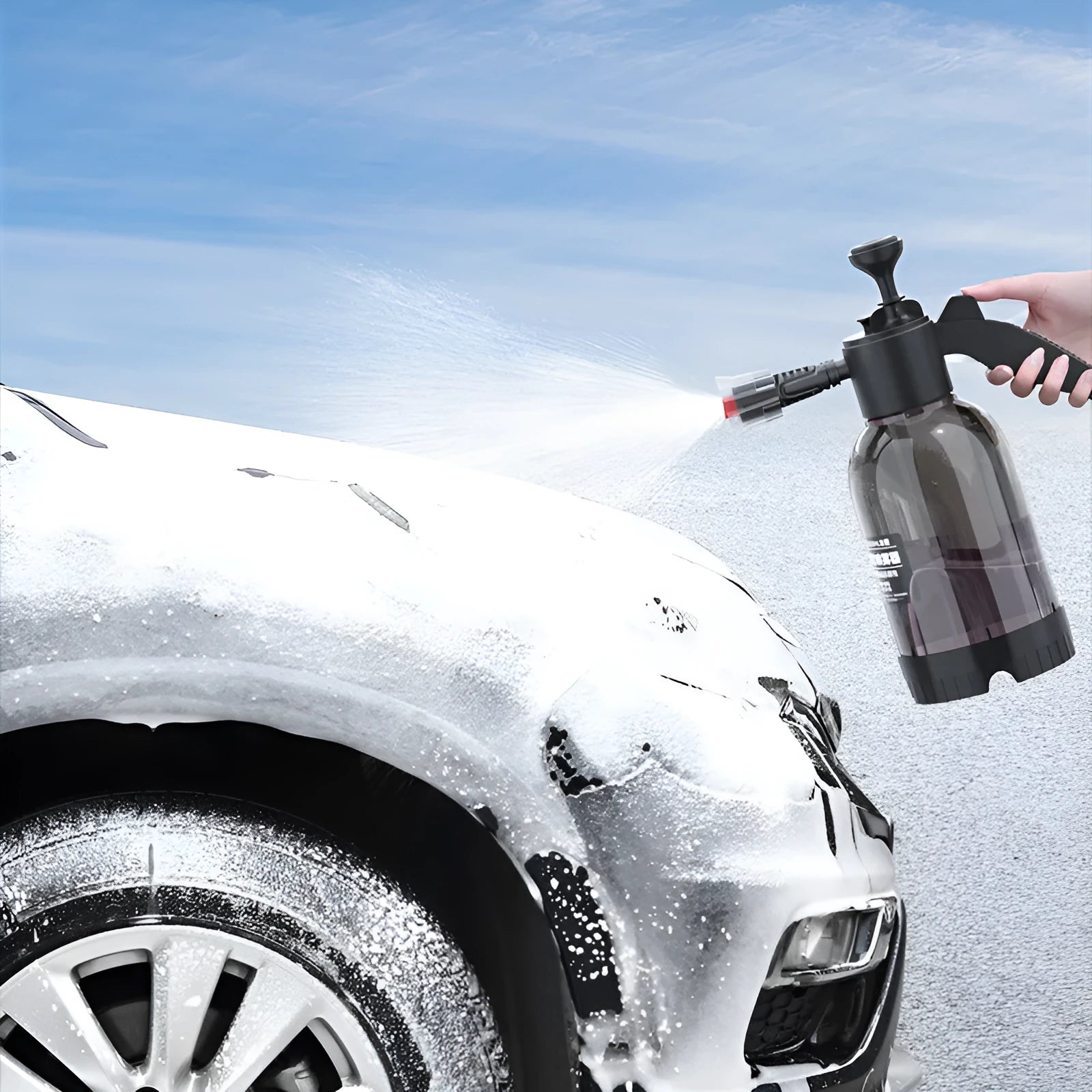 Black 2 litre handheld foam spray watering can with a comfortable handle and two nozzle attachments.