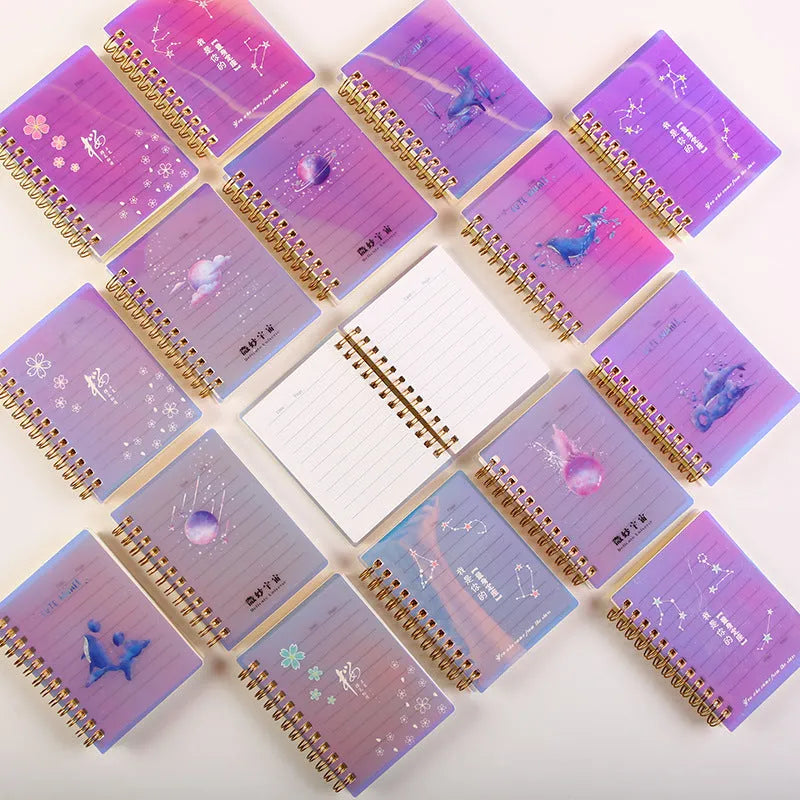Pack of four rollover coil A7 pocket notebooks showing constellation, sakura, ocean, and universe cover designs