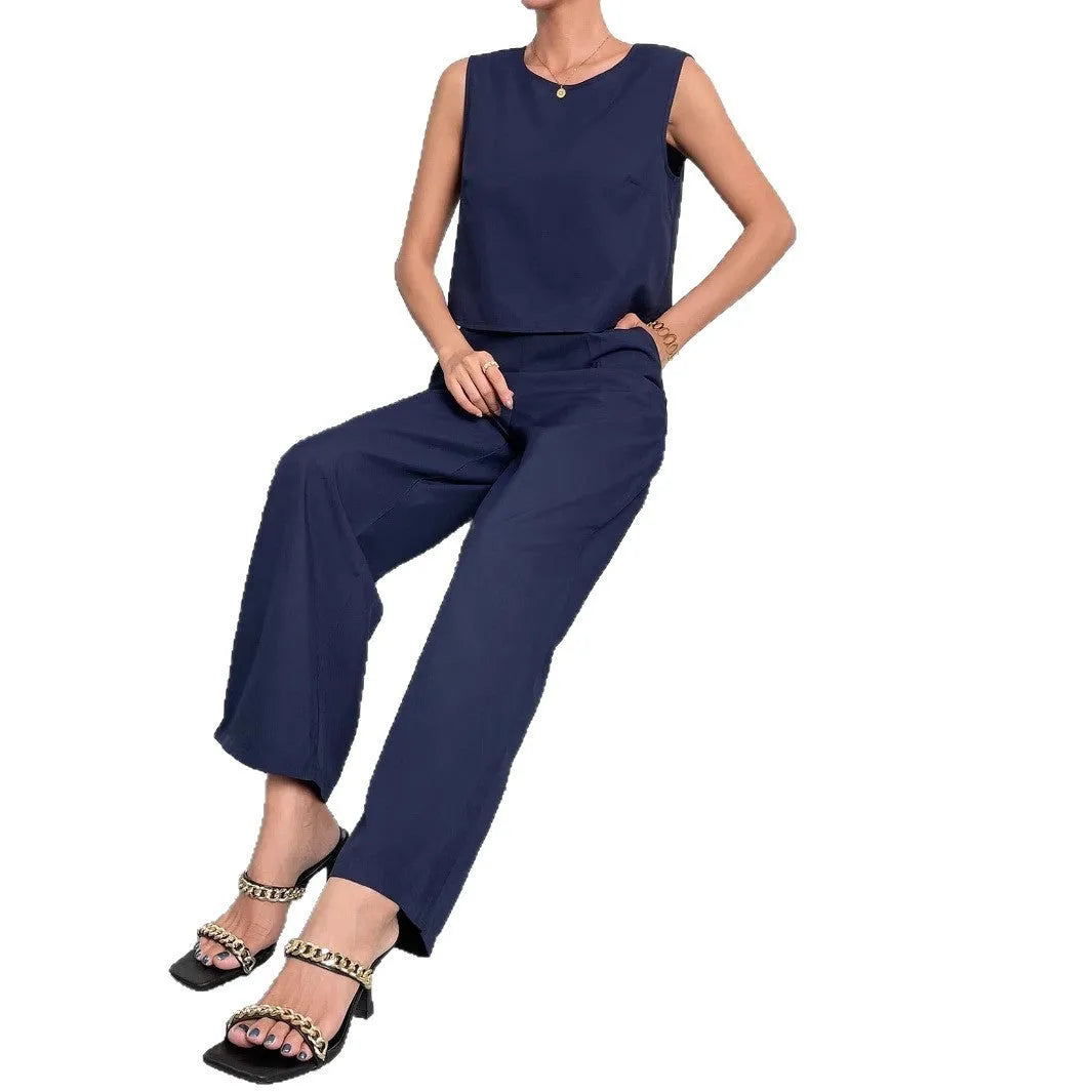 Women's red polyester two-piece set showing sleeveless round neck top with wide leg pants