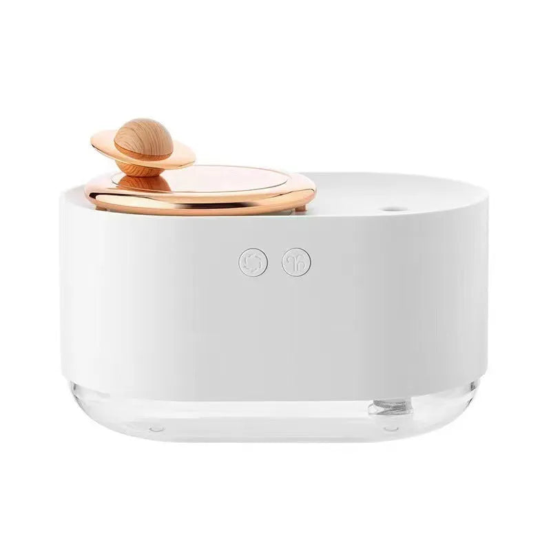 Rotating planet desktop humidifier with night light in green colour showing USB charging port and water tank