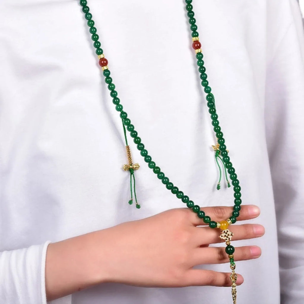 Brazil natural green agate multi-circle bracelet shown in hand, with certificate.