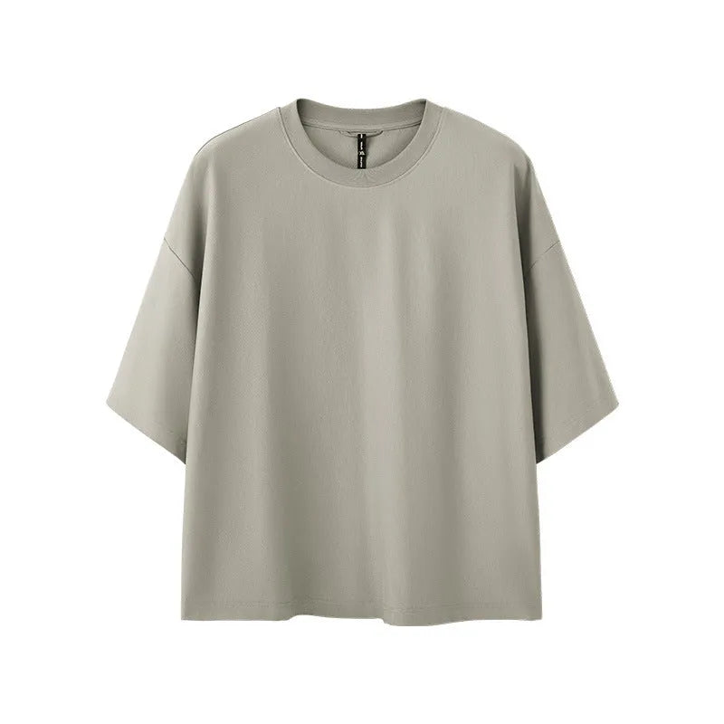 Men's sand grey loose fit short sleeve t-shirt showing regular sleeves and pullover style