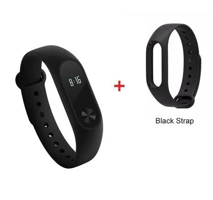 Black Xiaomi Mi Band 2 fitness tracker on wrist showing OLED display with heart rate data.