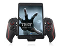 Wireless telescopic gamepad controller extended with mobile phone showing directional pad and buttons