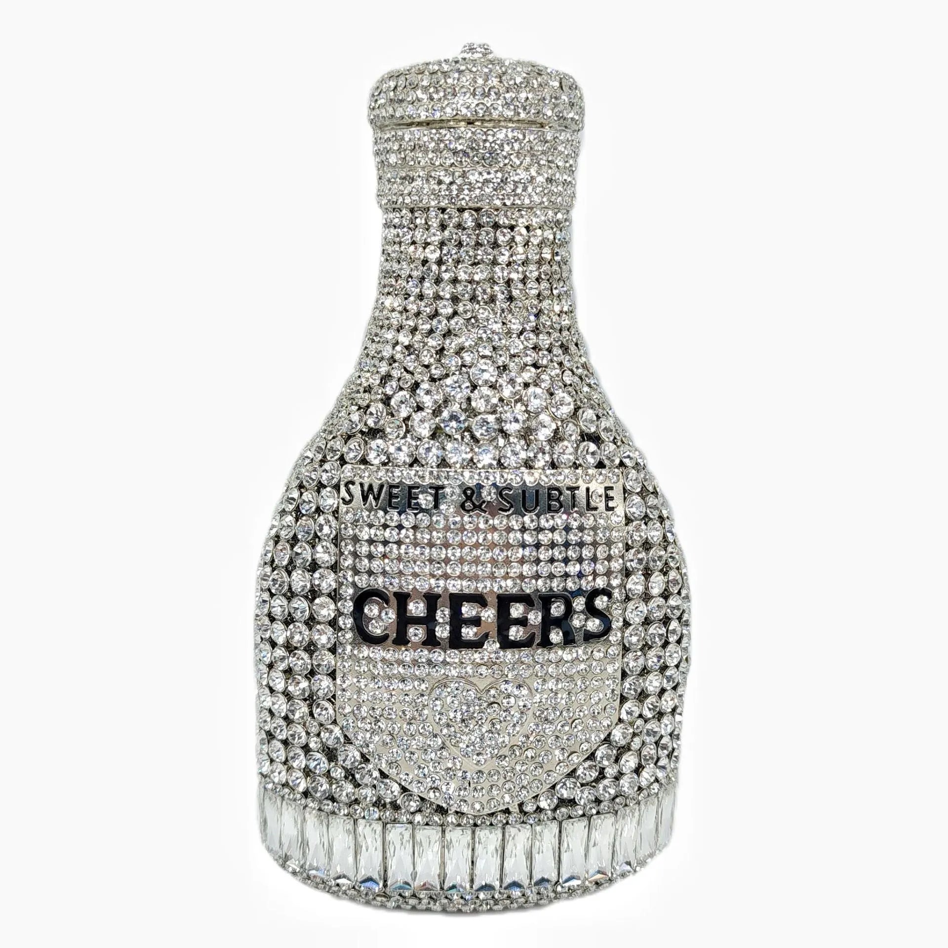 Gold rhinestone champagne bottle shaped evening clutch bag with wrist strap on a dark background.