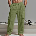 Man wearing loose-fitting, solid-colour cotton wide-leg casual trousers.