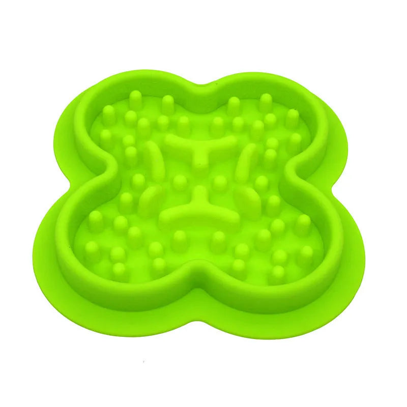 Silicone pet licking pad slow feeder mat in various colours on a flat surface