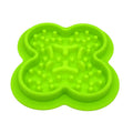 Silicone pet licking pad slow feeder mat in various colours on a flat surface