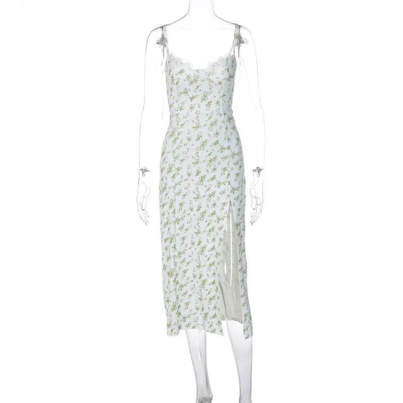 Women's long blue dress with lace flower print and slit suspender design.