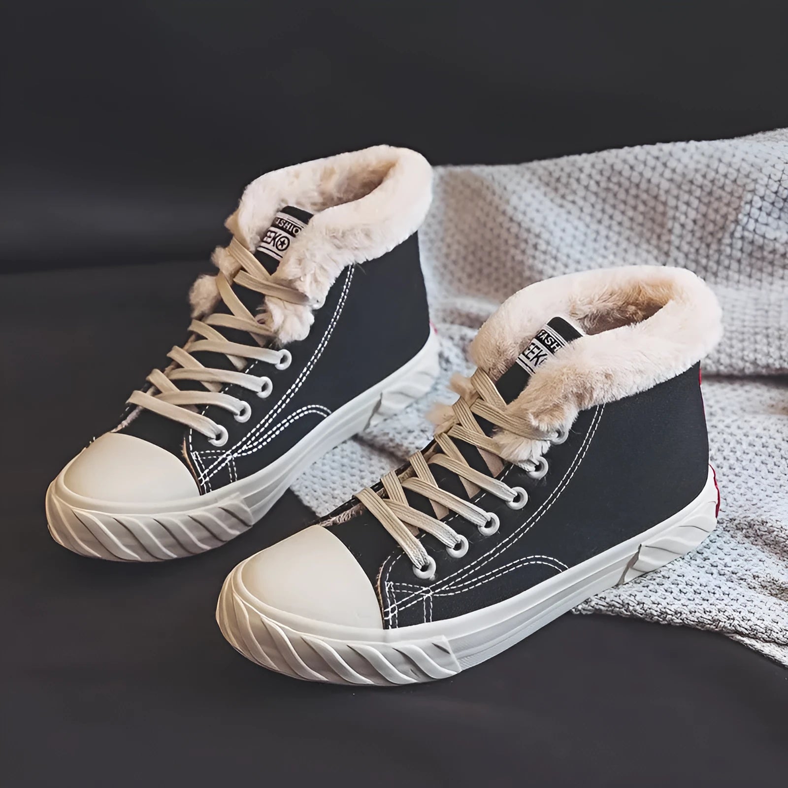 Black women's winter canvas shoes with velvet lining, animal pattern, buckle fastening, low-top rubber sole.