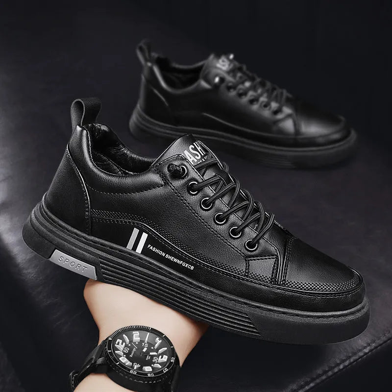 Men's white and black low-top skate shoes with elastic band and microfiber upper.