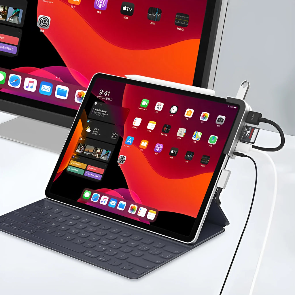 Silver aluminium grey 6-in-1 USB-C docking station for iPad Pro, showing HDMI and USB ports.