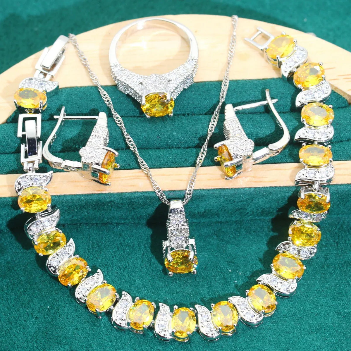 Bridal zircon necklace, earrings, ring, and bracelet four-piece jewellery set in alloy.