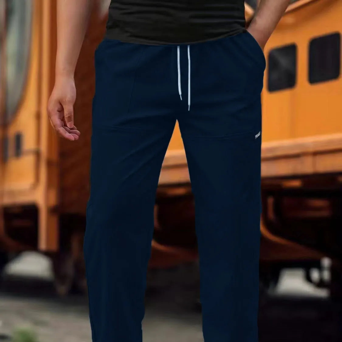 Men's polyester trousers for spring and autumn available in multiple colours and sizes