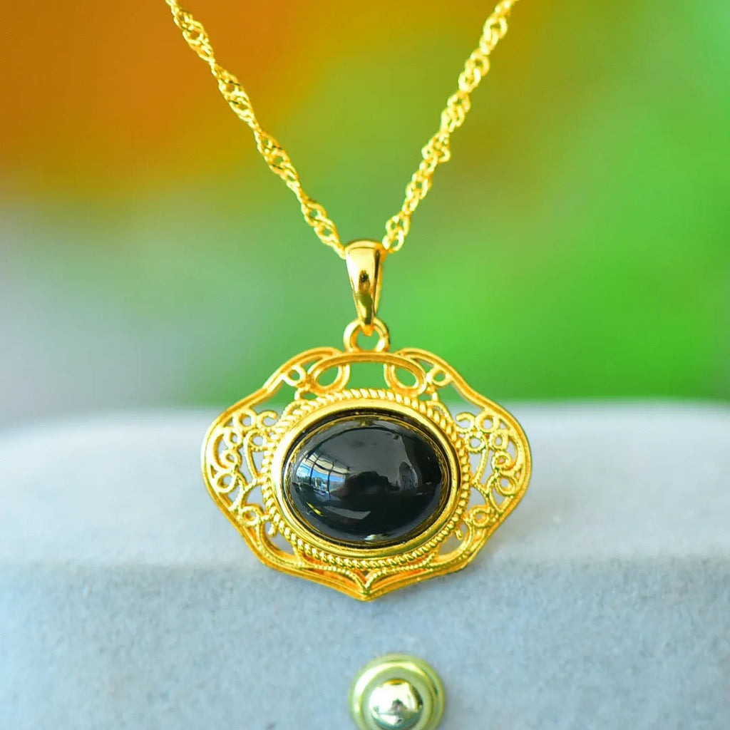 Flat grey Hetian jade pendant with copper wire inlay on an 18-inch chain.