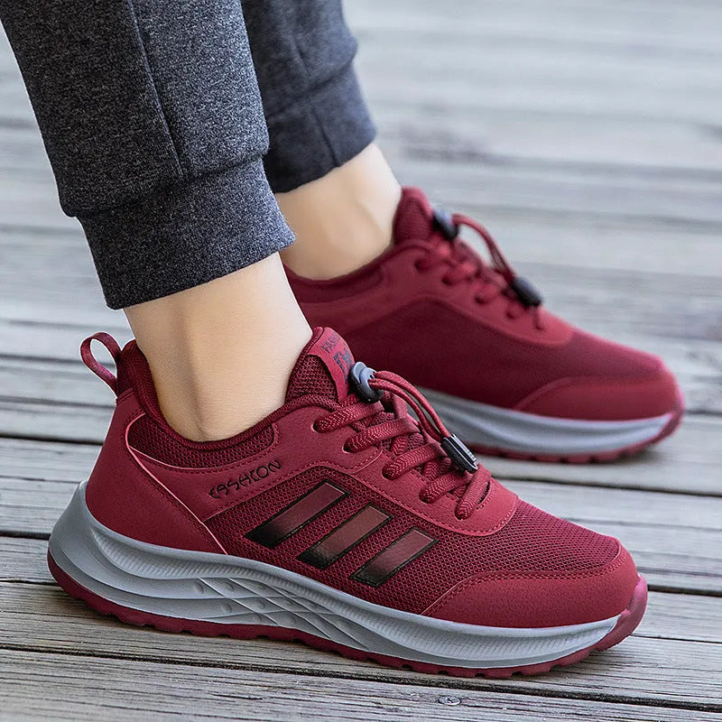 Men's and women's elastic band slip-on casual shoes in mesh material, showing colour options.
