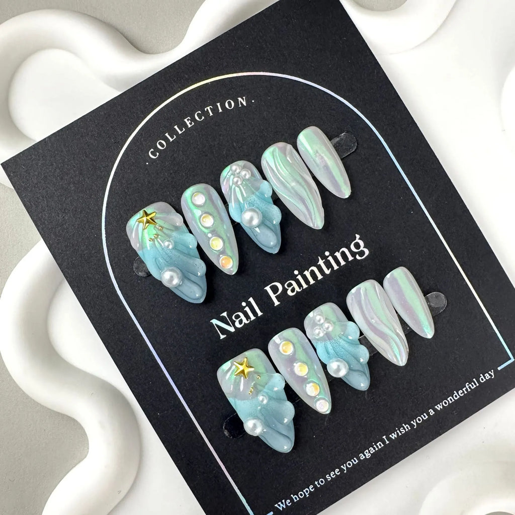 HAILANG blue plastic false nail tips set showing shell design with XS, S, M, L sizes.