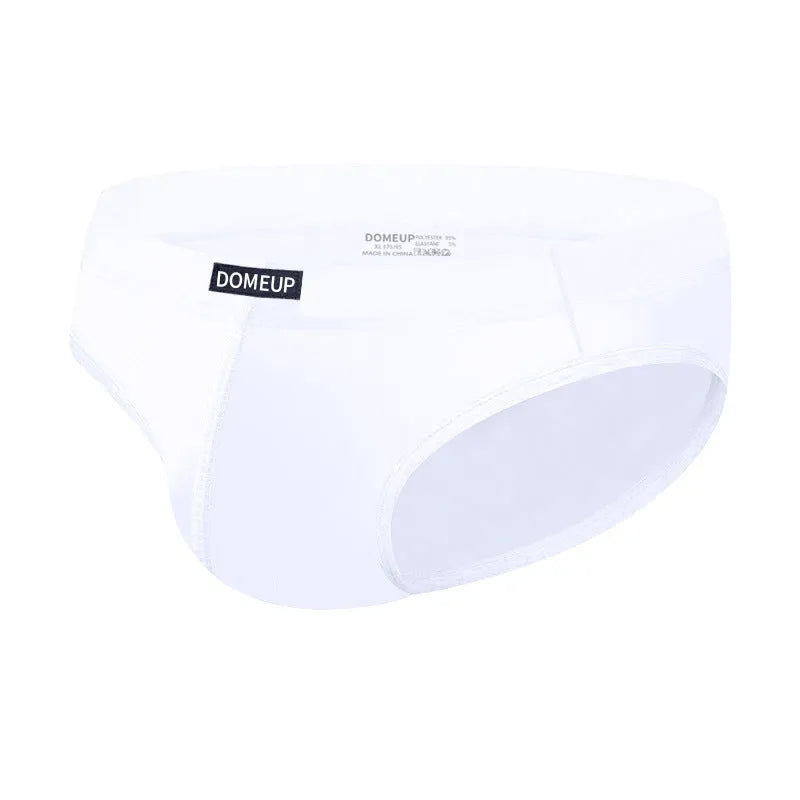Men's seamless polyester briefs in white, black and pink with low waist design