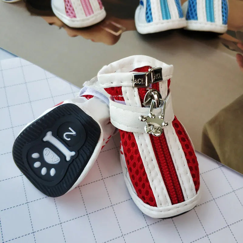 VIP-branded cloth dog sneakers with zipper closures in blue, pink or red colours