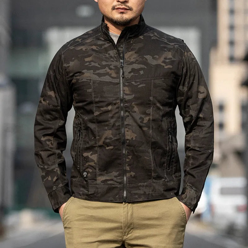 Men's brown tactical assassin jacket with camouflage pattern and multiple pockets.
