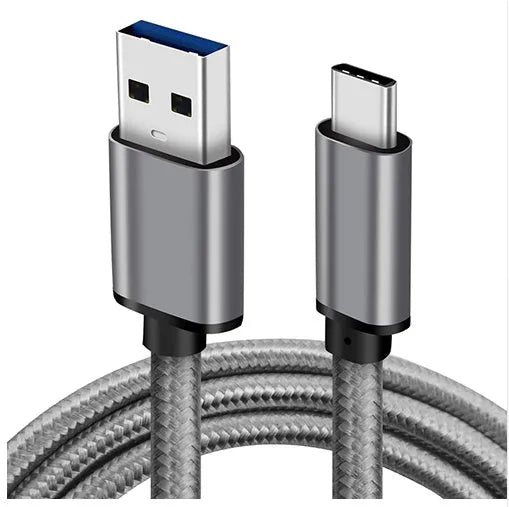 Gold USB Type-C to USB 3.0 braided charging cable with metal plugs on a white background.