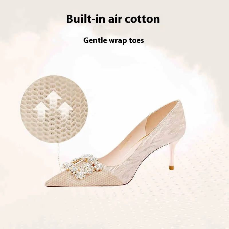 Champagne gold women's pointed-toe stiletto heels with rhinestone detail on the upper.
