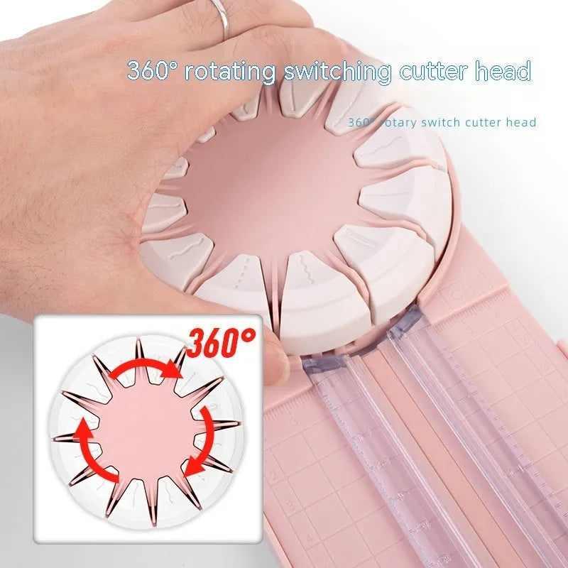 Plastic paper cutting machine with 12 multifunctional heads in pink colour on craft table