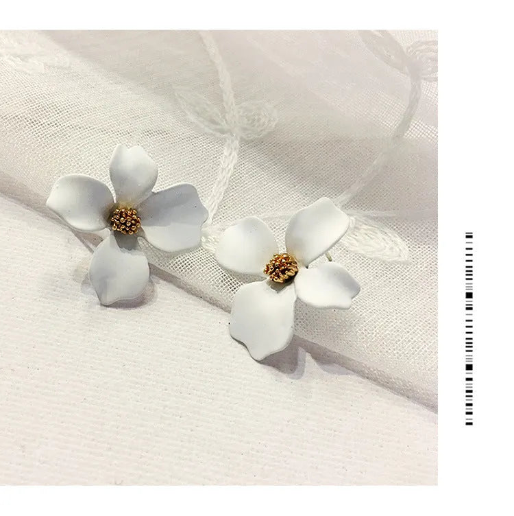 Flower shape stud earrings in pink and white colours with electroplated finish