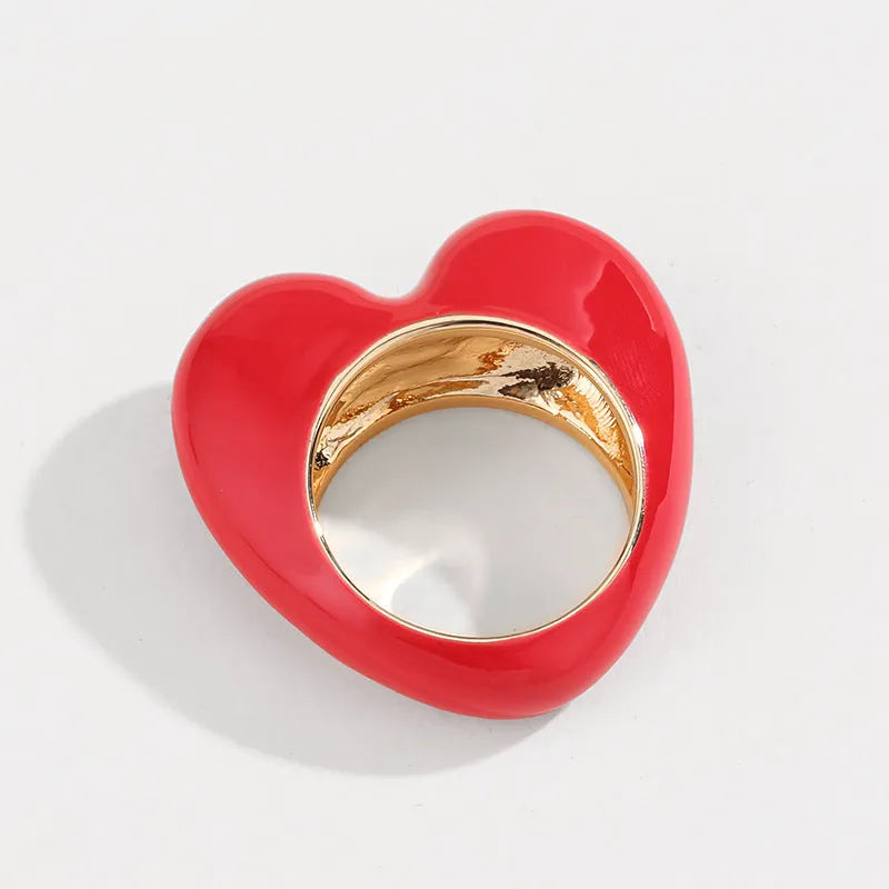 Three-dimensional heart-shaped enamel fashion ring in choice of colours on zinc alloy.