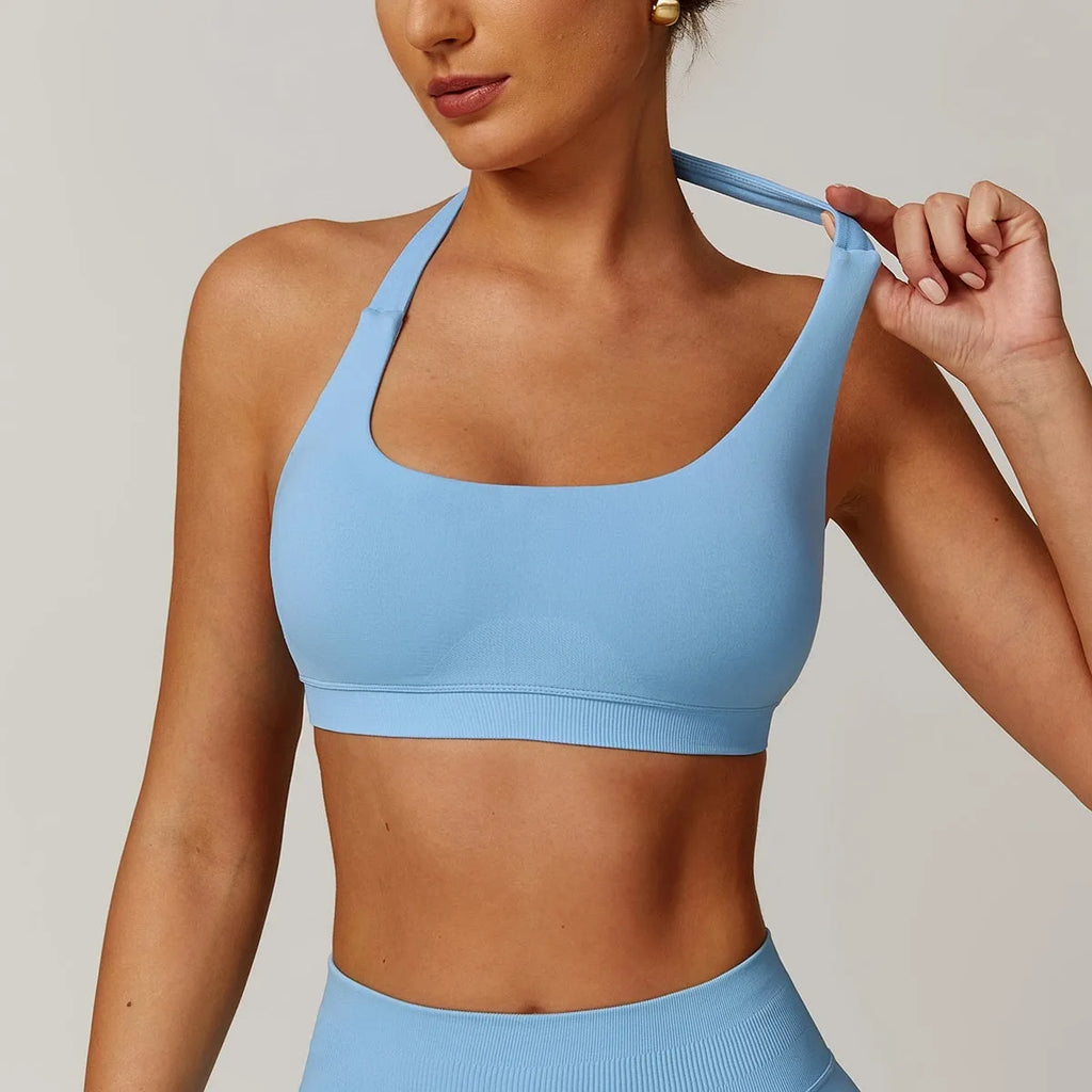 Women's halter style yoga sports bra in various colours with removable chest pads