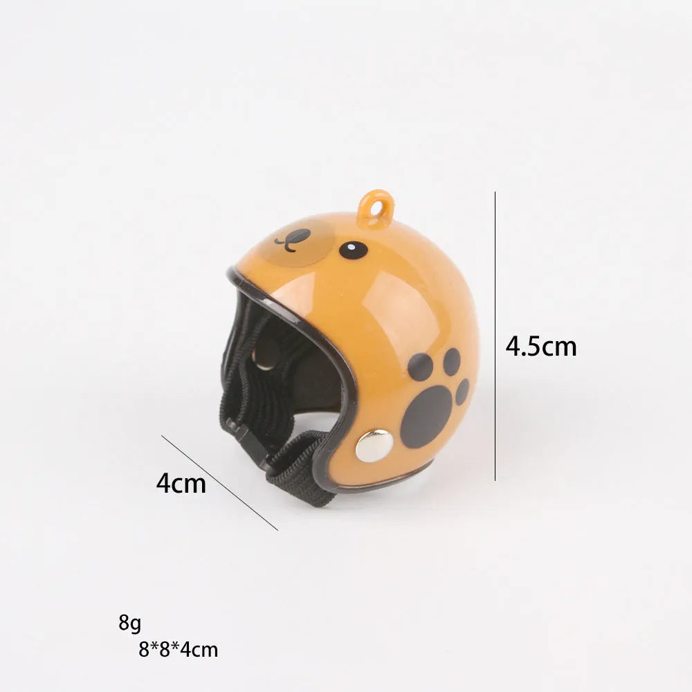 Small hard plastic helmet with elastic straps and sponge lining for a chicken or pet bird.