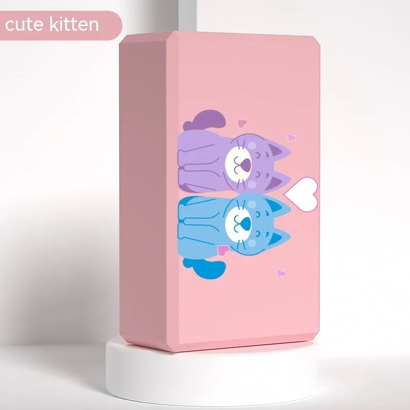 High-density EVA yoga block in pink next to a dark blue block, showing 7.5cm height and printed cartoon design options.