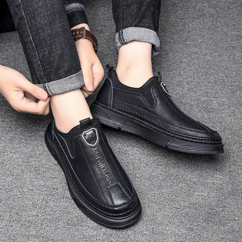 Men's black and brown leather casual shoes with round toe design on size display