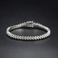 Silver plaid bracelet for women with moissanite stone on neutral background showing woven pattern and clasp