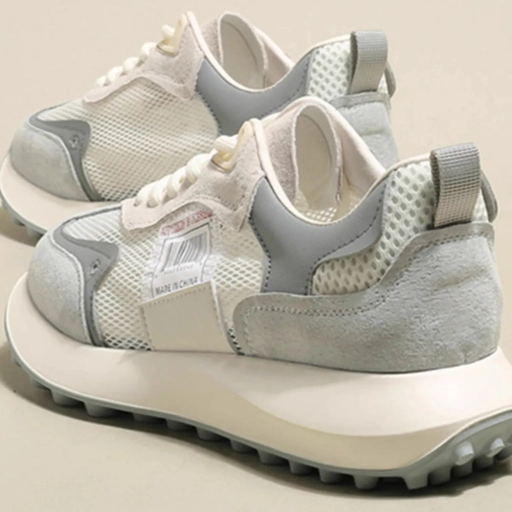 Women's grey and pink low-top retro sneakers with round toe and flat rubber sole