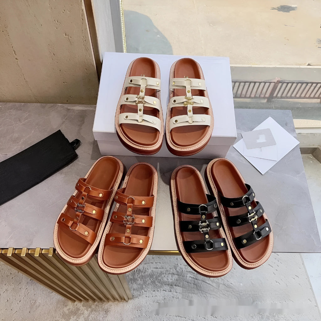 Women's white patent leather Roman sandal slippers with sheepskin lining shown from the side.
