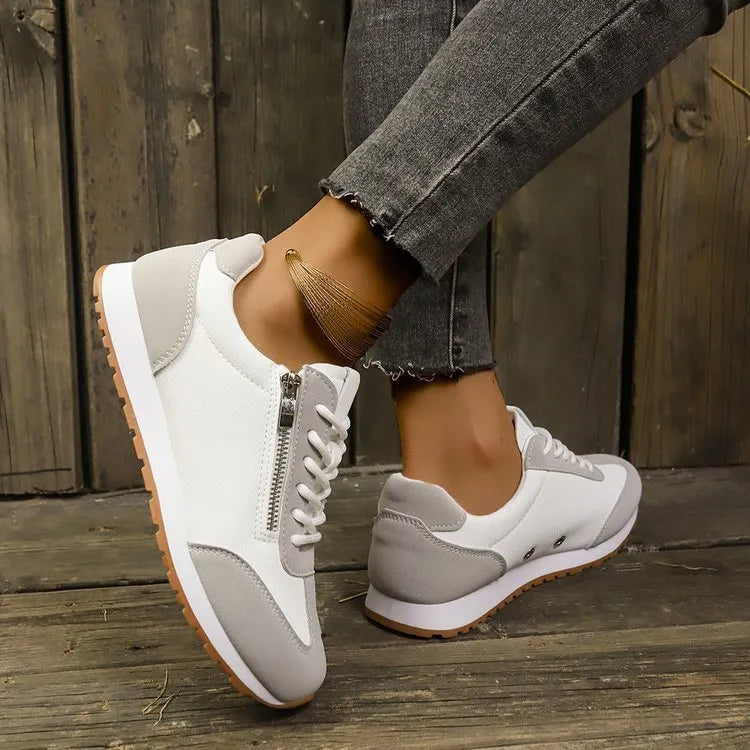 Women's flat-heeled shoes in grey, white or Champagne with artificial PU uppers and rubber soles