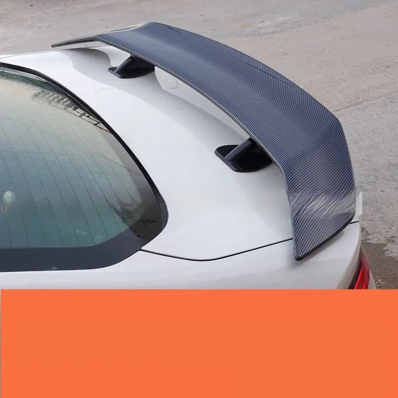 Universal car punch-free tail wing spoiler in ABS plastic with four finish options