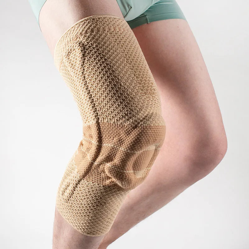 Adult sports kneepad in black and blue colours showing knee protection design