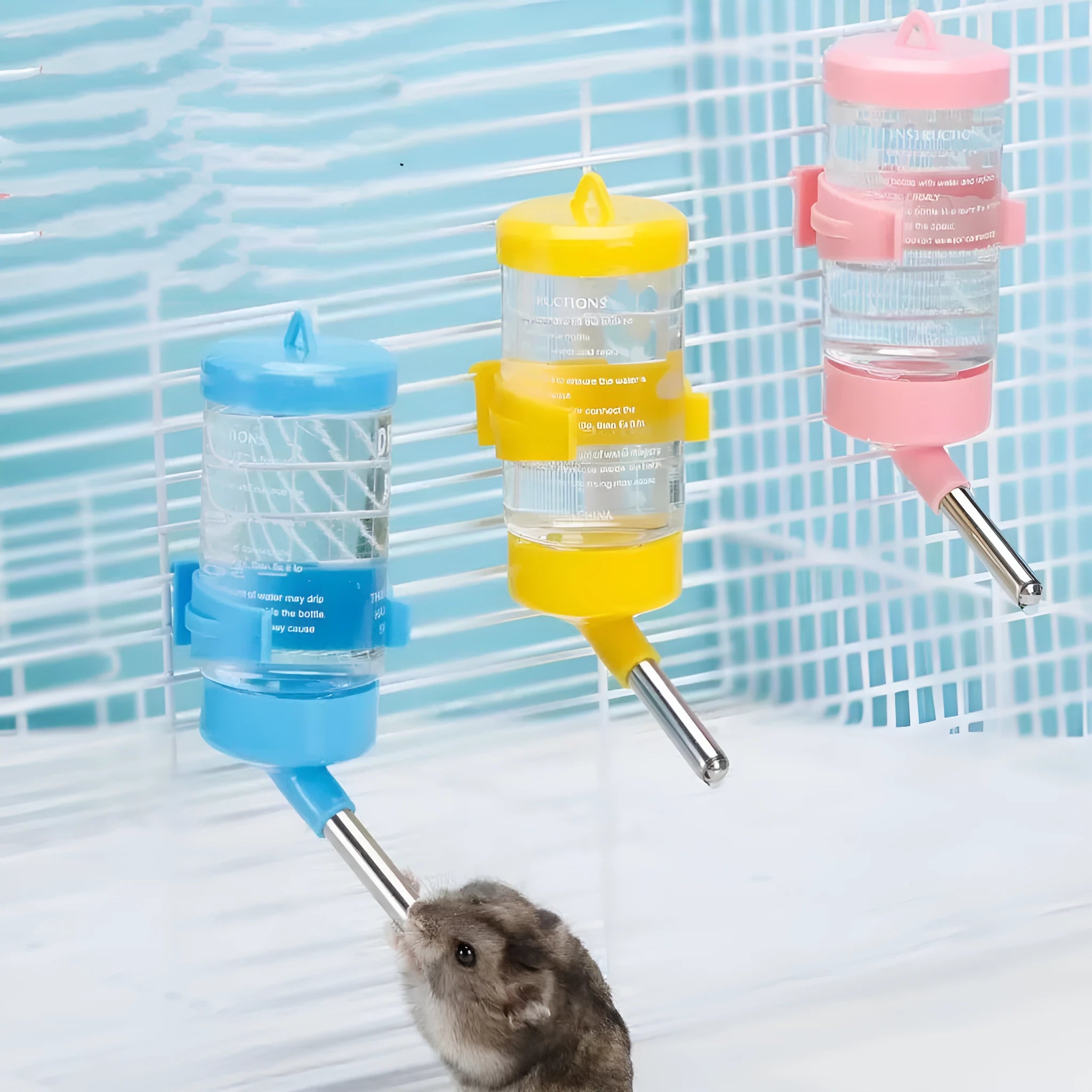 Green ball kettle pet water feeder with glass tube on a white background.