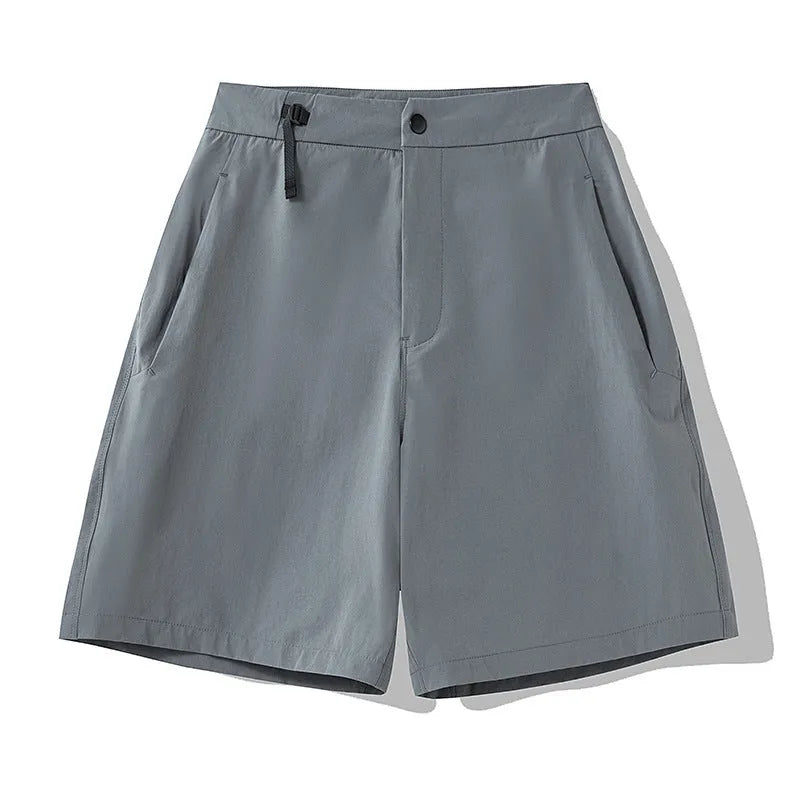 Men's solid colour quick-dry sports shorts with elastic construction for running and climbing.