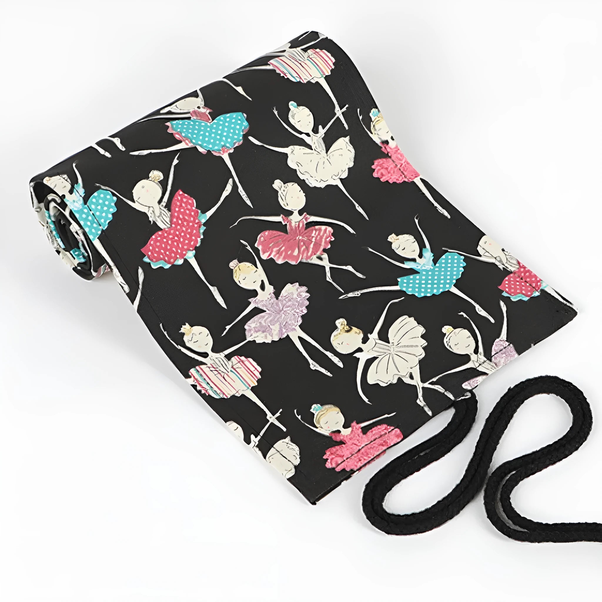 Square canvas rolling pencil case with ballet girl print, showing interior holes for storing pencils.