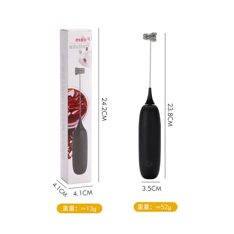 Black and white electric milk frother handheld blender for coffee drinks