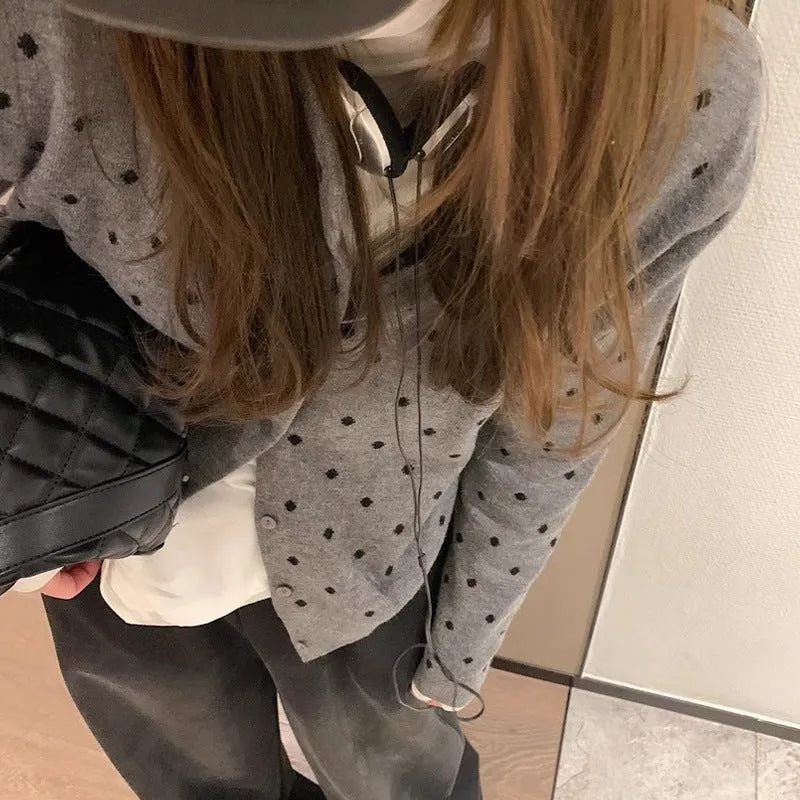 Gray dot knitted cardigan with crochet flower detail on woman, Korean style loose fit